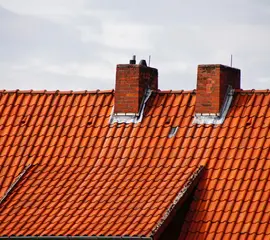 Newly finished tile roof with chimneys – Dallas Roofings