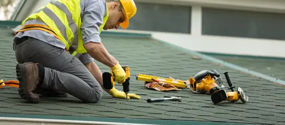 Roofer performing shingle roof maintenance – Dallas Roofings