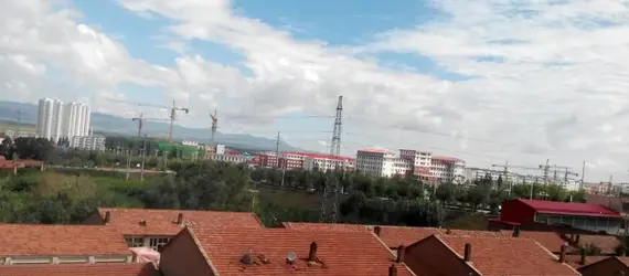 Aerial view of residential rooftops and skyline – Dallas Roofings